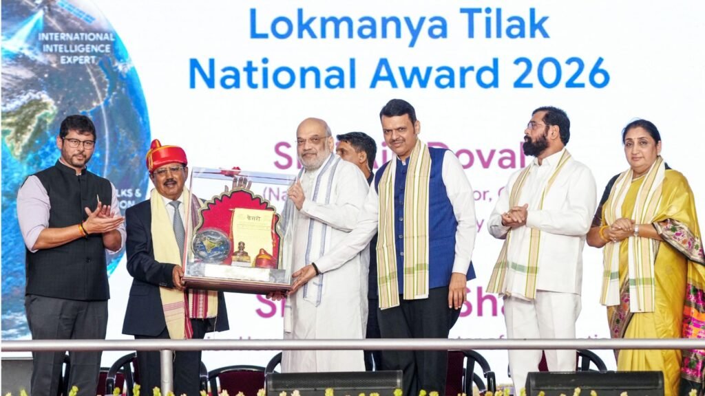 amit-shah-presents-nsa-doval-with-lokmanya-tilak-national-award